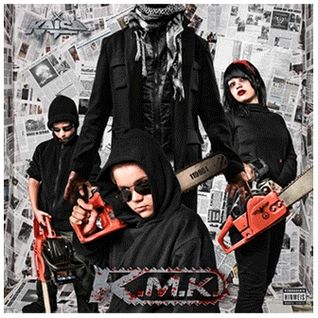 K.M.K.
